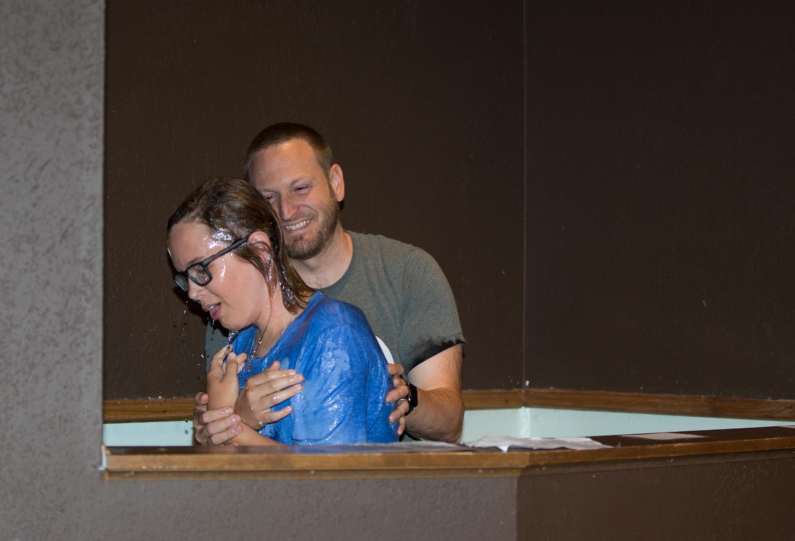 Pastor Kevin baptizing Lucy